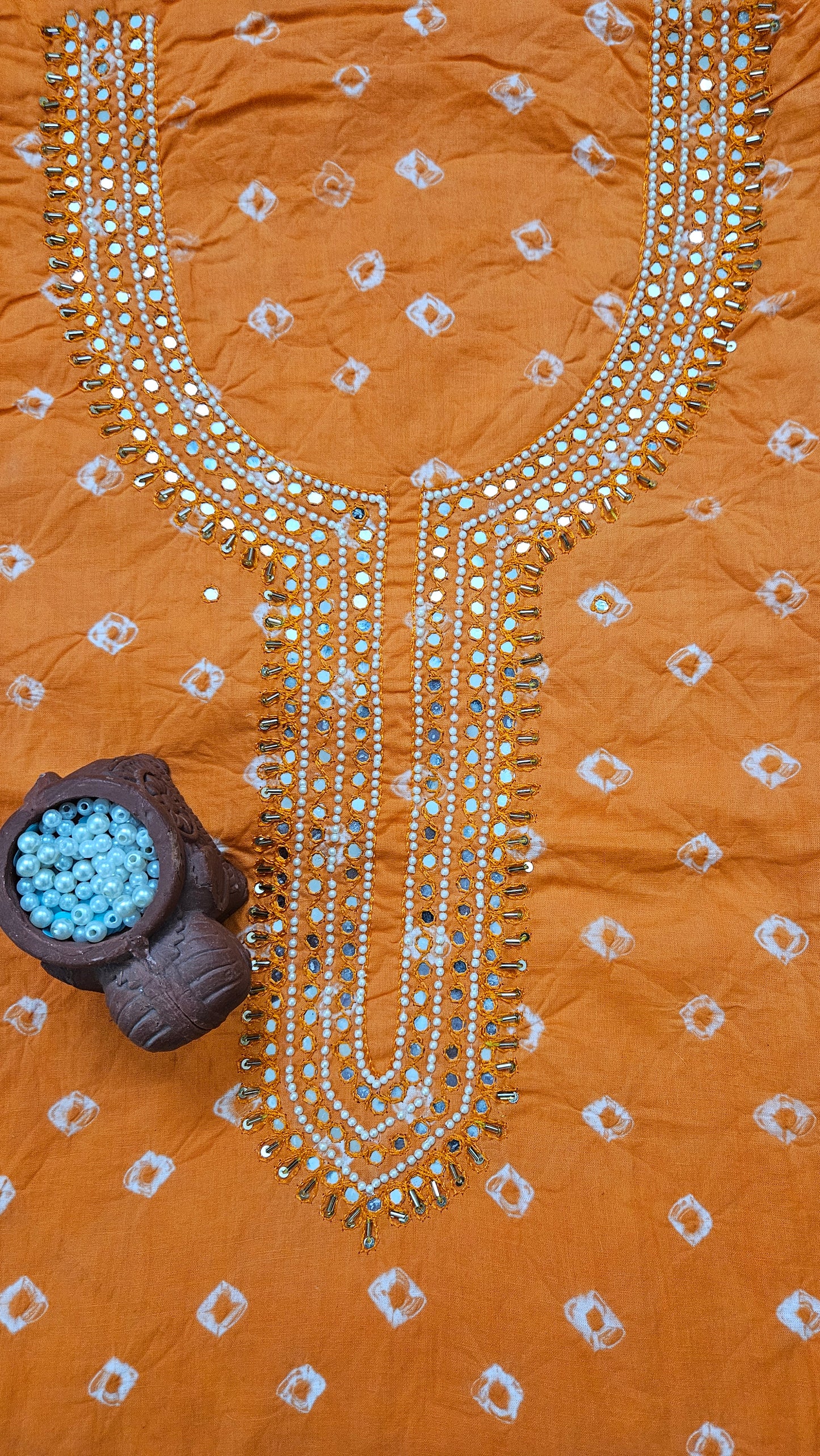 Orange'n'white bandhani cotton suit with chiffon dupatta