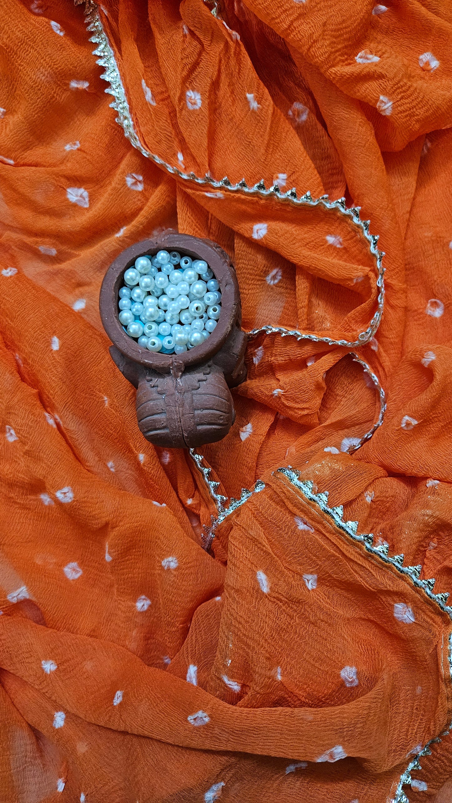 Orange'n'white bandhani cotton suit with chiffon dupatta